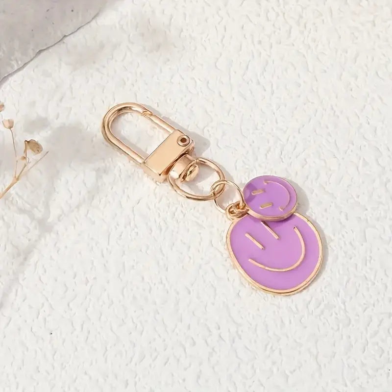 DOUBLE HAPPY FACE KEYCHAIN - PURPLE