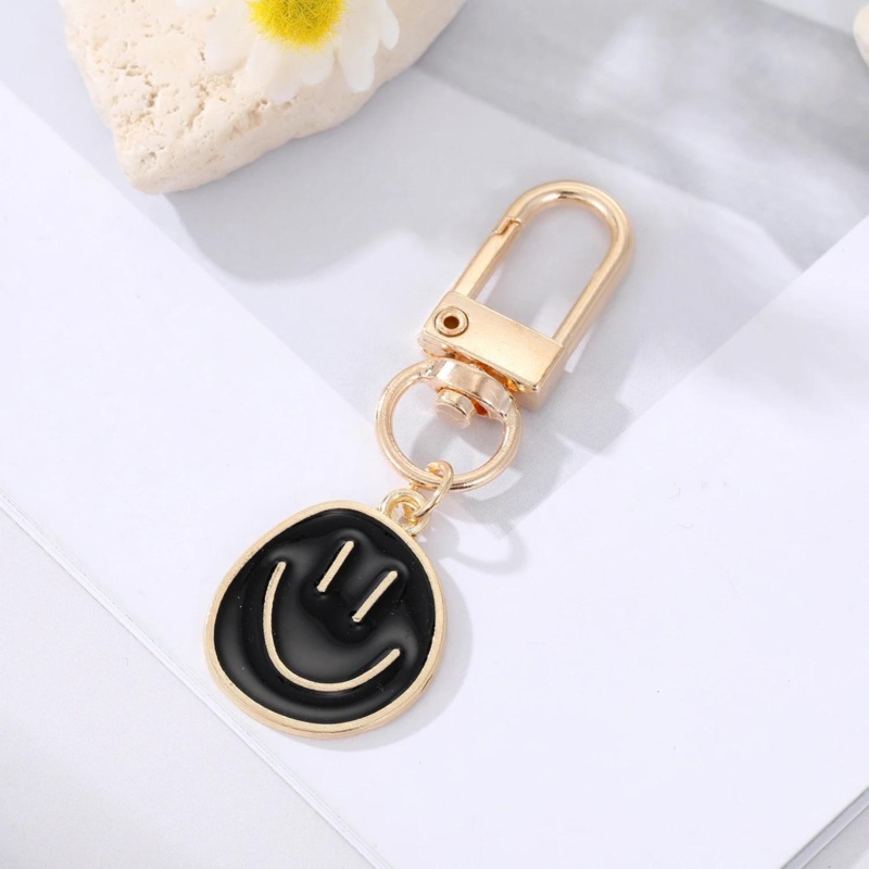 HAPPY FACE KEYCHAIN - BLACK